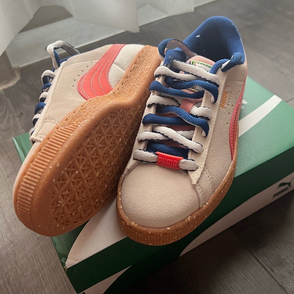 Puma soft gray, cream, coral, and blue sneakers with cork look soles
